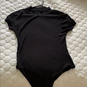 Black mock neck body suit